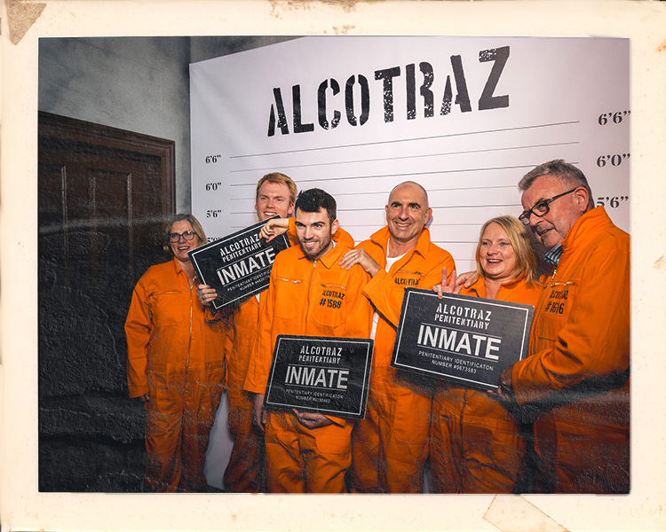 Inmates being processed at Alcotraz - beginning of the immersive prison-themed cocktail bar experience