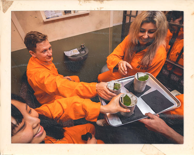 Corporate team building at Alcotraz - prison-themed immersive cocktail bar ideal for work nights out and group activities.