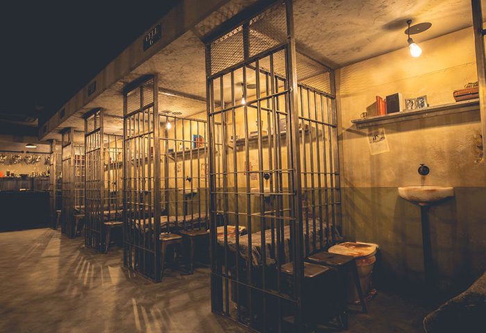 London Alcotraz venue interior with jail cells - immersive prison-themed cocktail bar experience in the heart of the city.