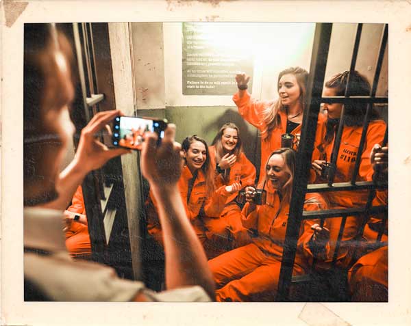 Stag and hen party Alcotraz - prison-themed immersive cocktail bar for pre-wedding celebrations.